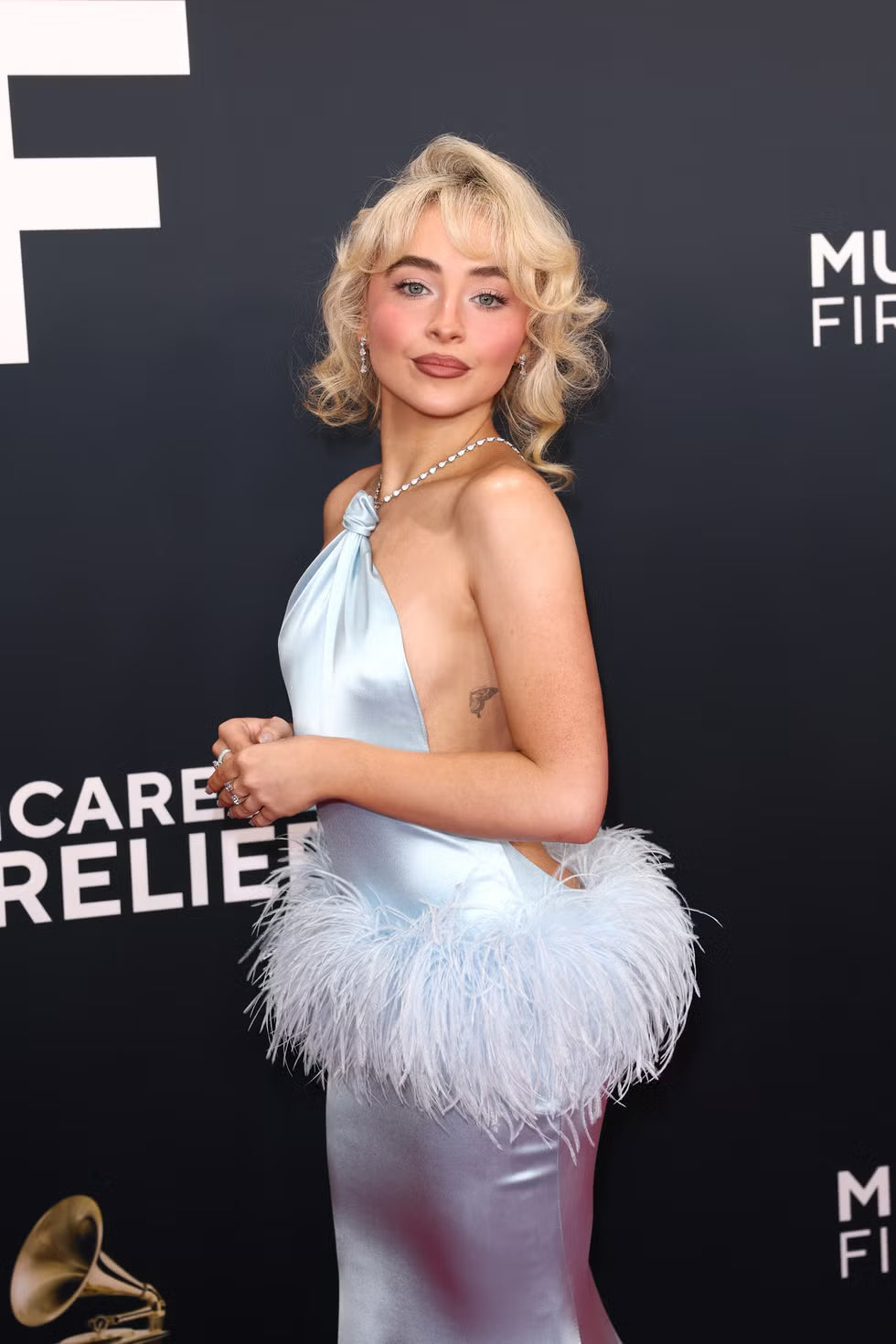 Sabrina Carpenter's Dazzling Jewelry at the 2025 Grammys:A Closer Look