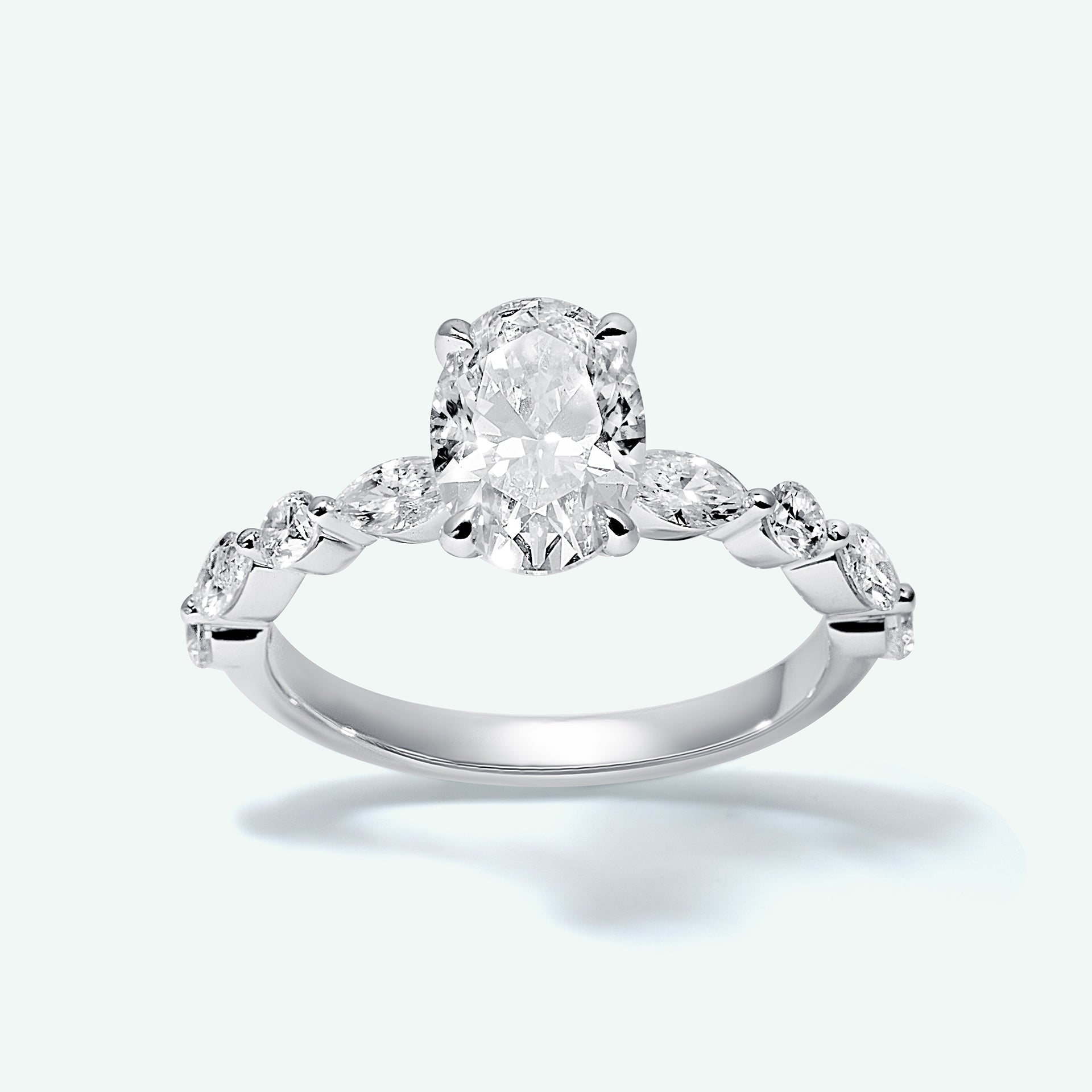The Smiley With 1.50ct Oval Shape Center Diamond (VVS2, G) IGI Certified